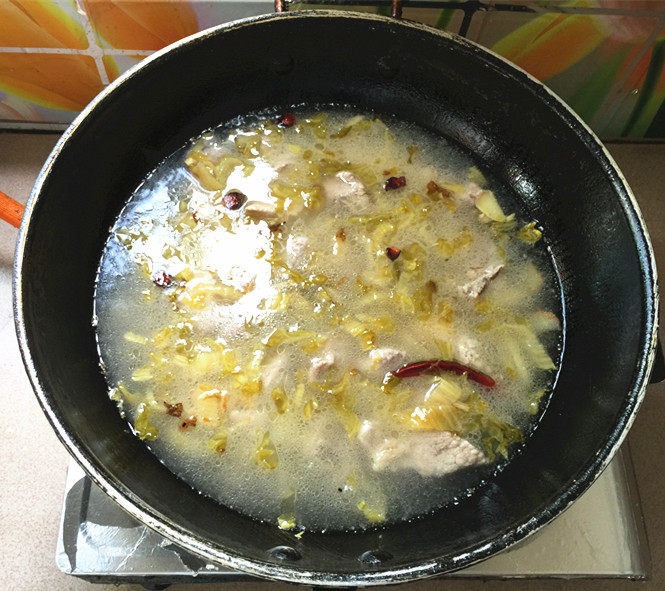 酸菜炖豆腐排骨步骤12