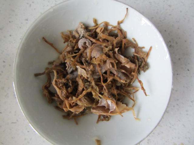 明油笋干菜煮茭白步骤6