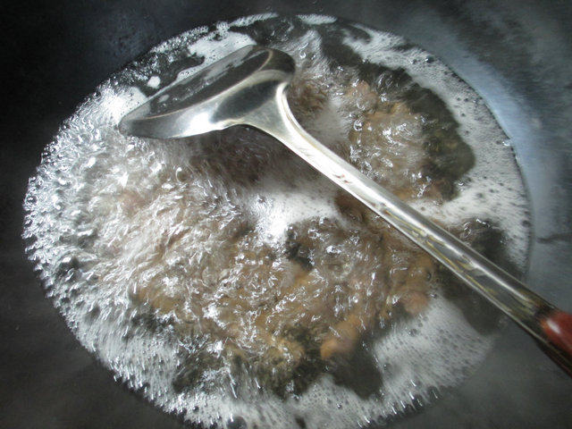 豆豉炒钉螺步骤3
