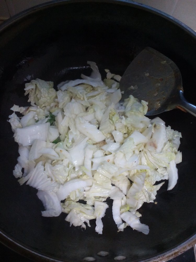白菜海蛎子肉炖豆腐步骤6
