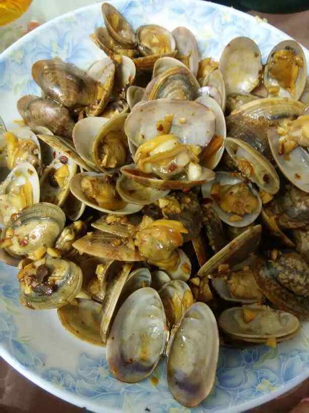 老干妈炒花甲螺步骤7