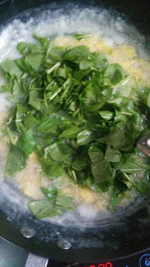 小米青菜蛋花粥步骤9