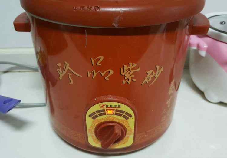 宝宝辅食大米黑米粥步骤5