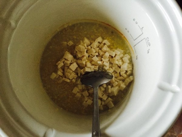 菠菜豆腐鳕鱼小米粥步骤7