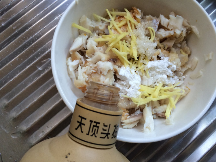 花生鱼蓉粥步骤11