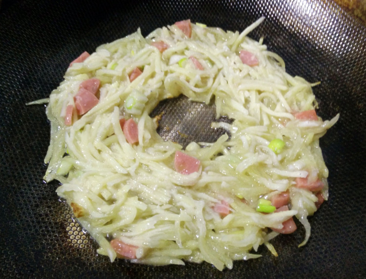 窝蛋土豆丝饼步骤7