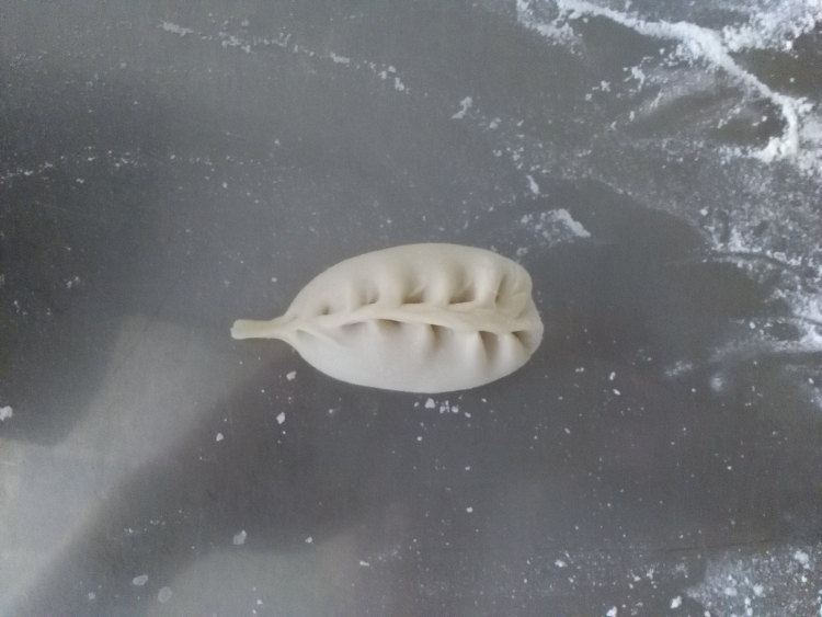 西葫芦红油水饺步骤17