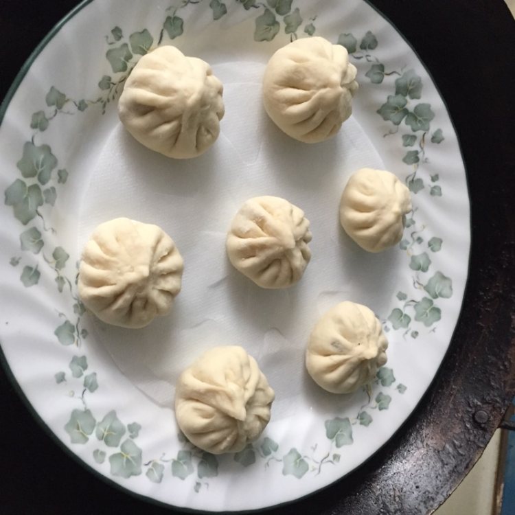 梅干菜包子。步骤12