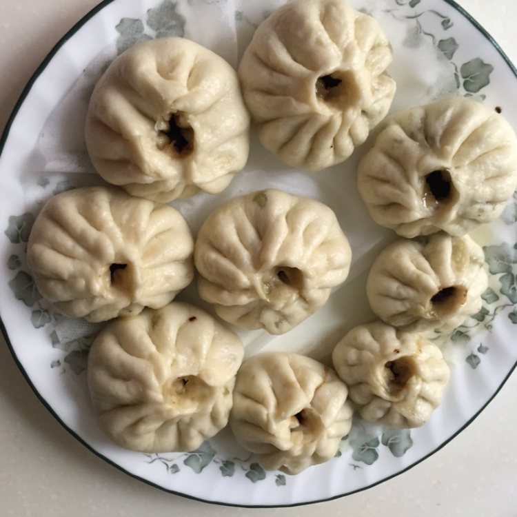 梅干菜包子。步骤13