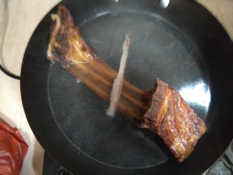 腊排骨炖干豆角步骤2