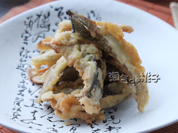 干炸鲜蘑步骤7