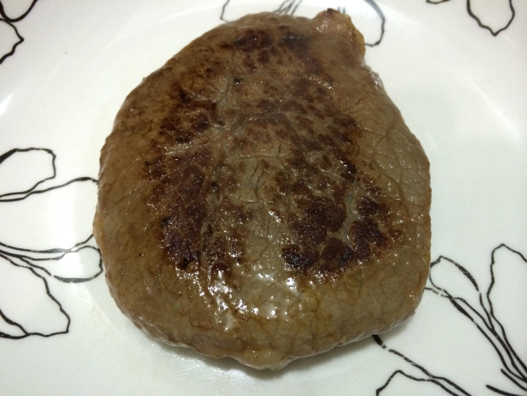 谷饲肉眼牛扒步骤11
