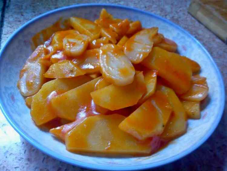 土豆炒年糕步骤7