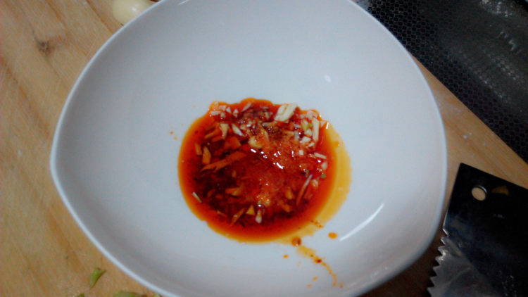 酸菜腊肉鸡婆头步骤13