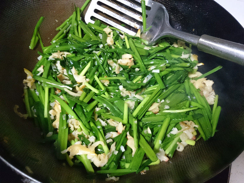 蚬子干炒韭菜步骤11