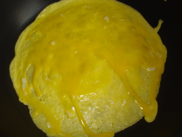 荠菜蛋包饭步骤10