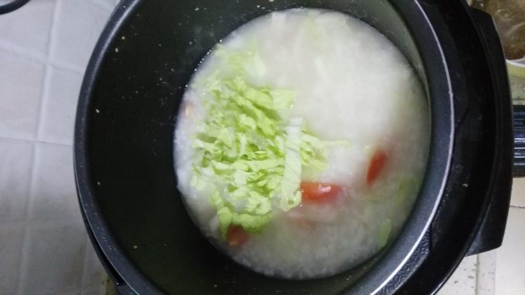 白菜西红柿瑶柱粥步骤6