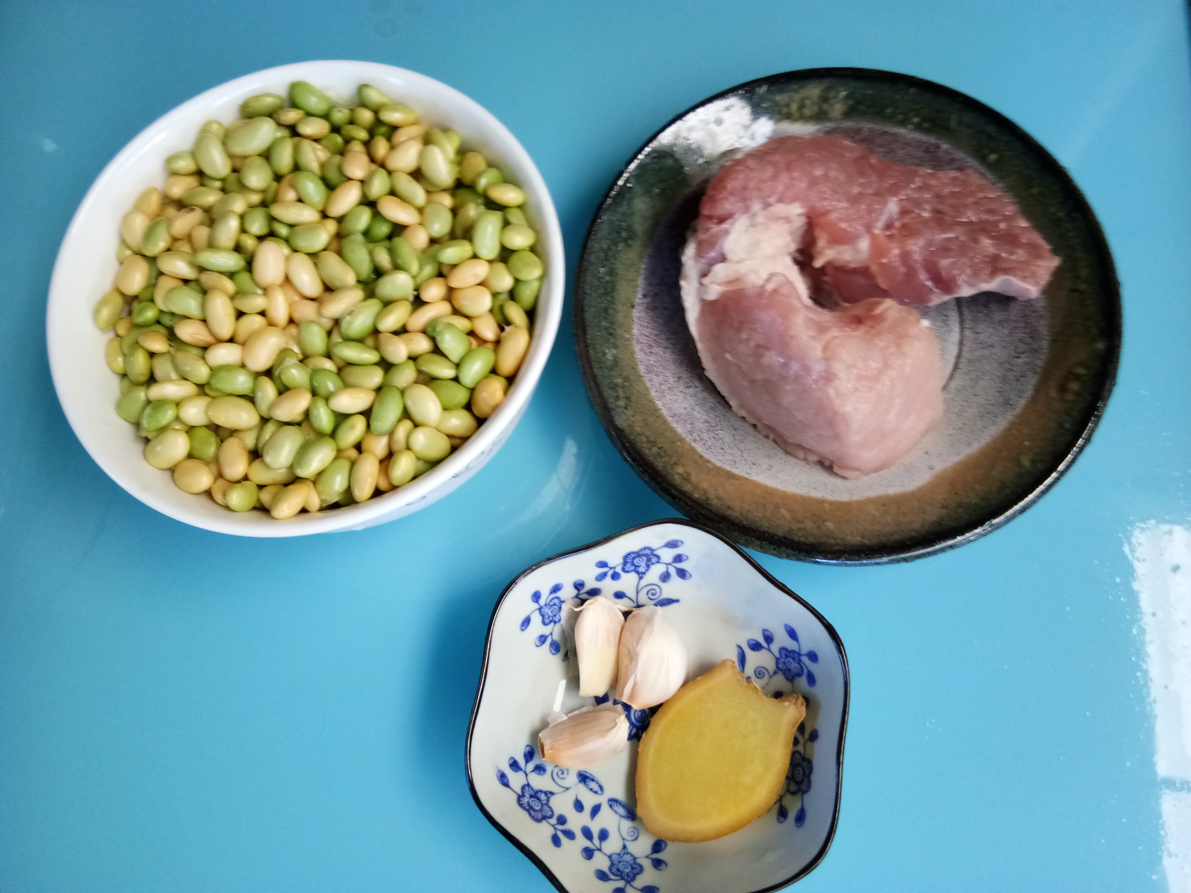 毛豆炒肉丁步骤1