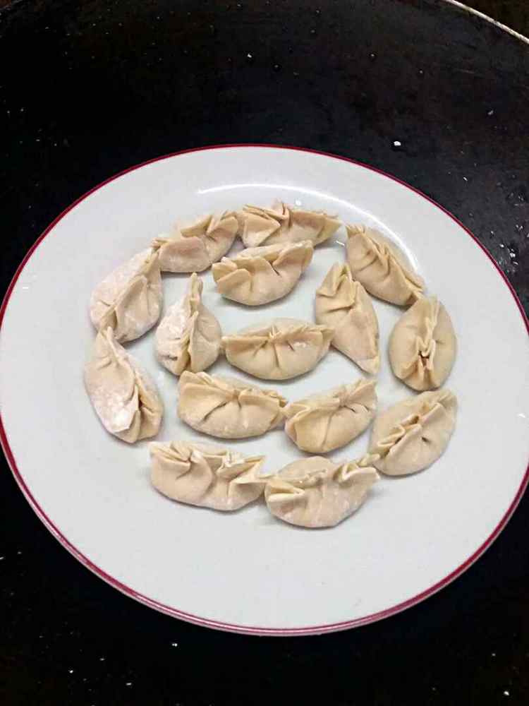 猪肉连藕饺子步骤7