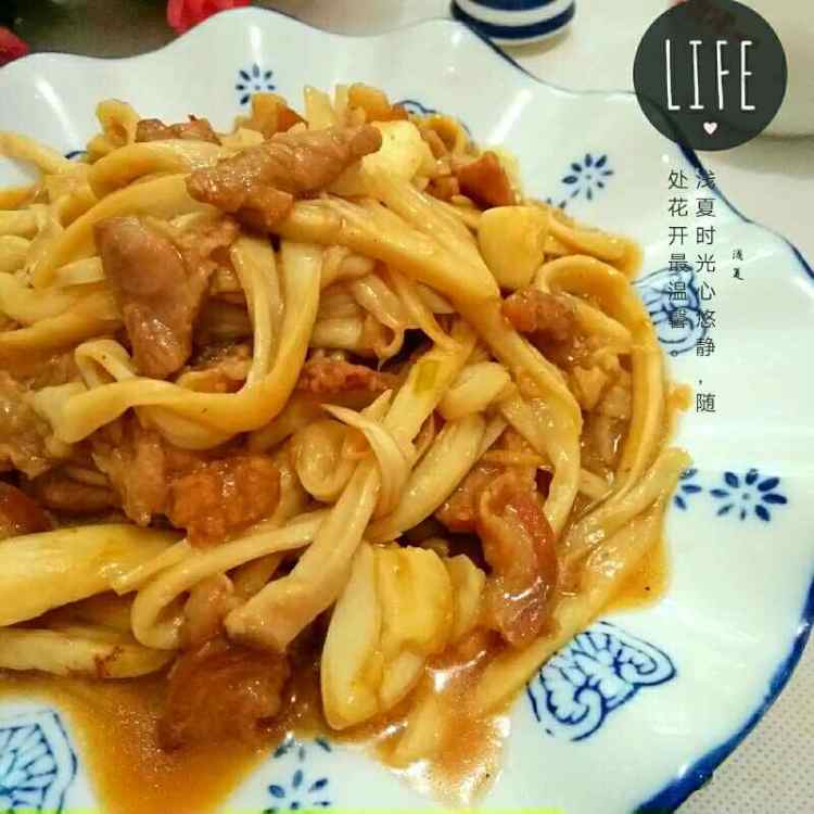 手撕杏鲍菇炒肉片步骤9