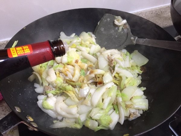 白菜炒年糕步骤9