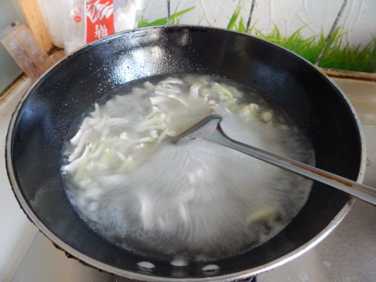 西红柿肉丝煮年糕步骤10