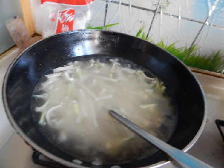 西红柿肉丝煮年糕步骤12