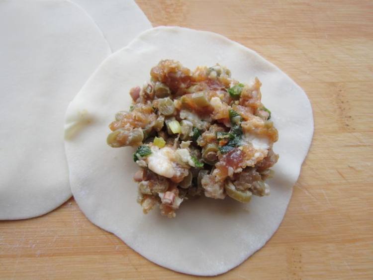 酸豇豆肉末煎饺步骤9