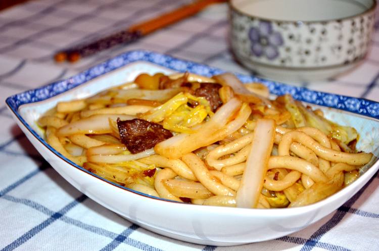 土豆粉炒白菜步骤11