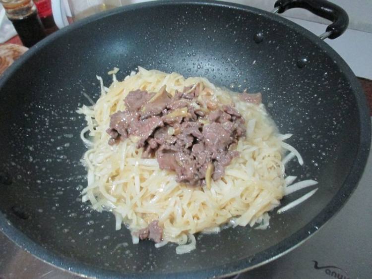 牛肉炒白萝卜丝步骤9