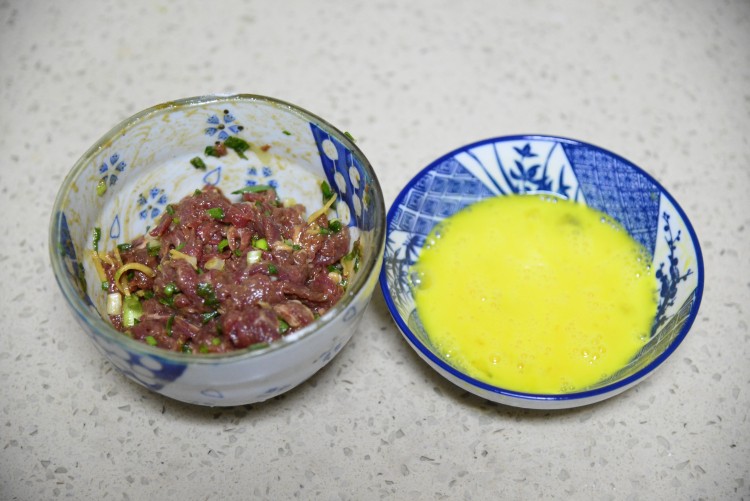 滑蛋生滚牛肉粥步骤4