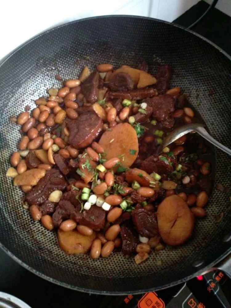 土豆花生烧牛肉步骤11