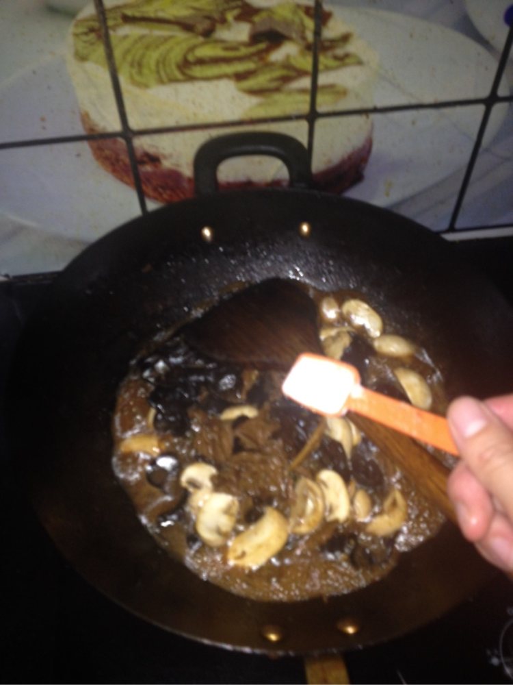 牛肉炒平菇步骤10