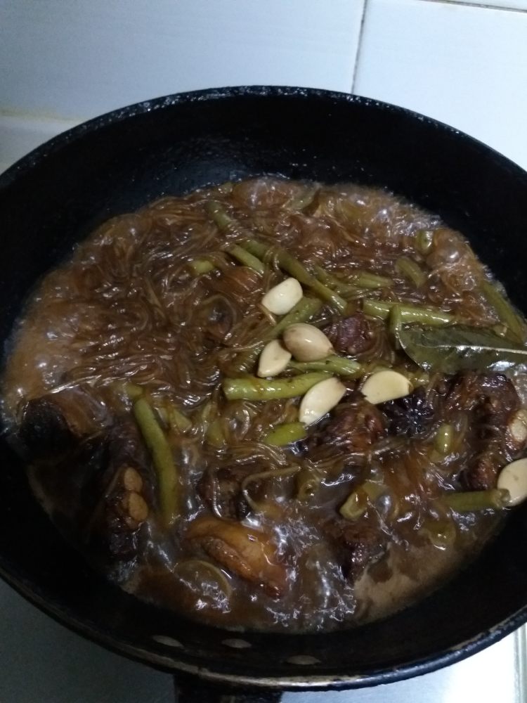 豆角粉条炖排骨步骤10