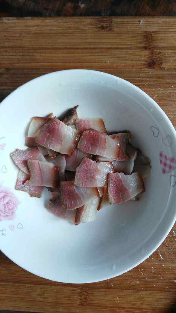 腊肉炒酸四季豆步骤4