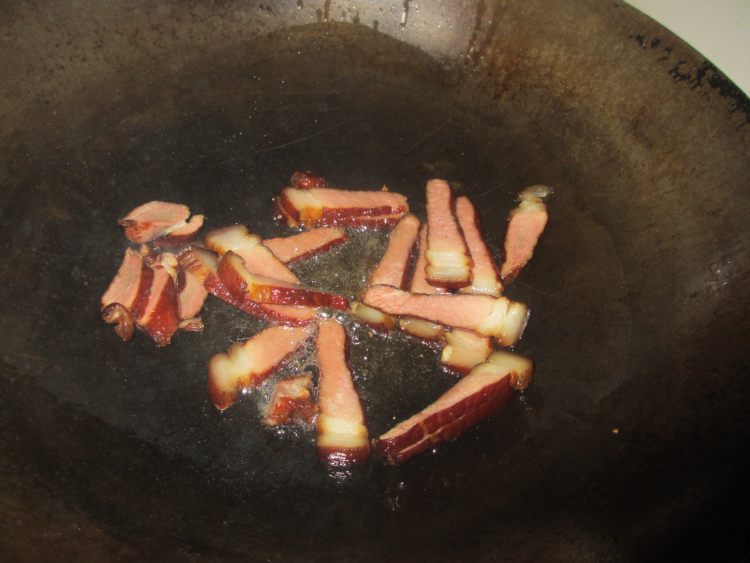 腊肉炒年糕步骤6