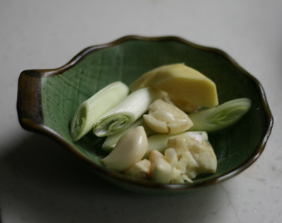 腊肉焖土豆步骤5
