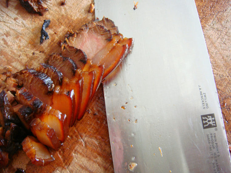 腊肉片炒蒜苔步骤3