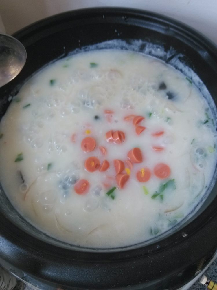 皮蛋火腿牛奶粥步骤7