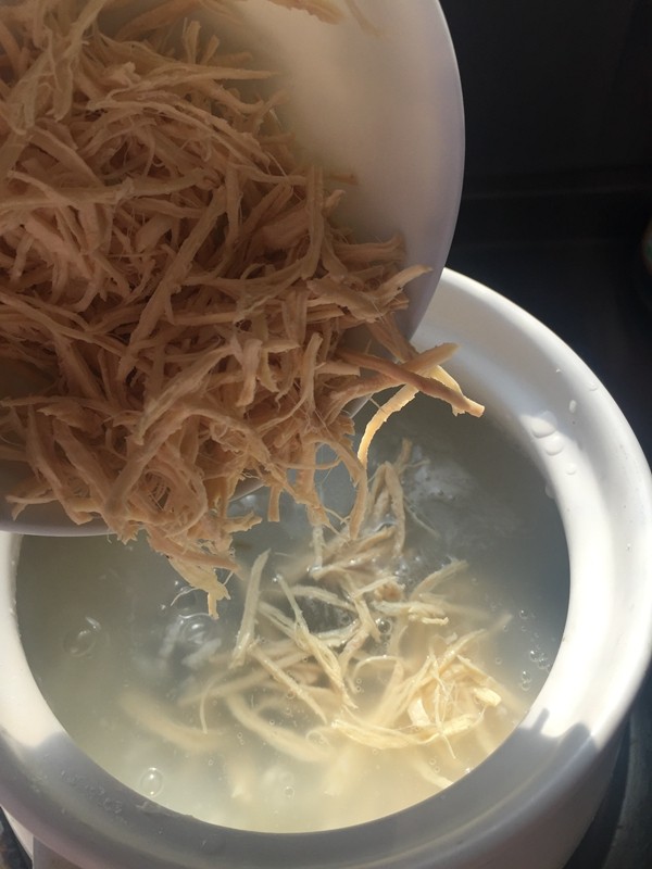 鸡丝皮蛋粥步骤9