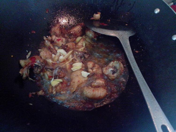 酸菜鸡肉炖粉条#新鲜步骤3