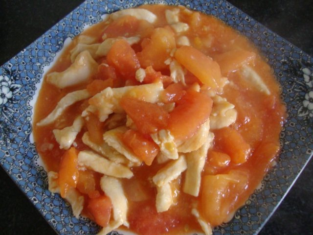 西红柿炒鸡肉步骤6