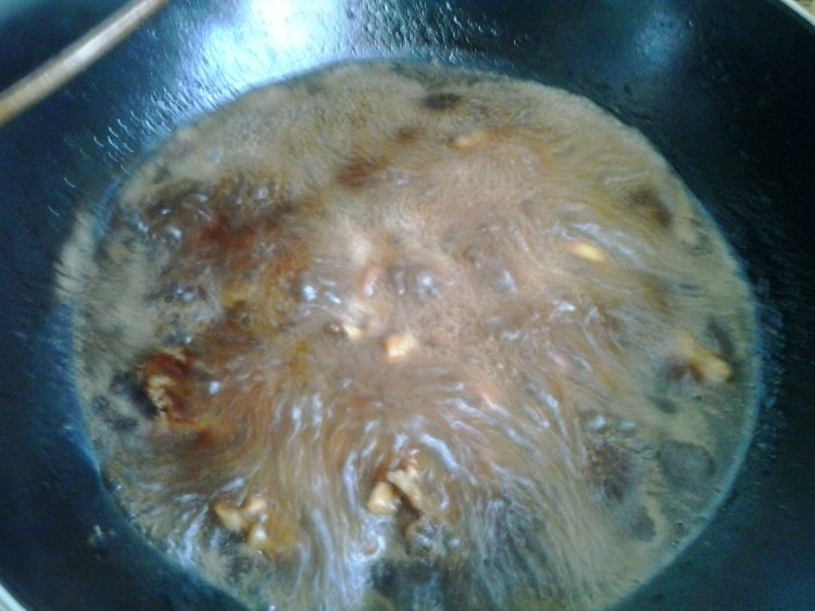 板粟炖鸡块步骤11