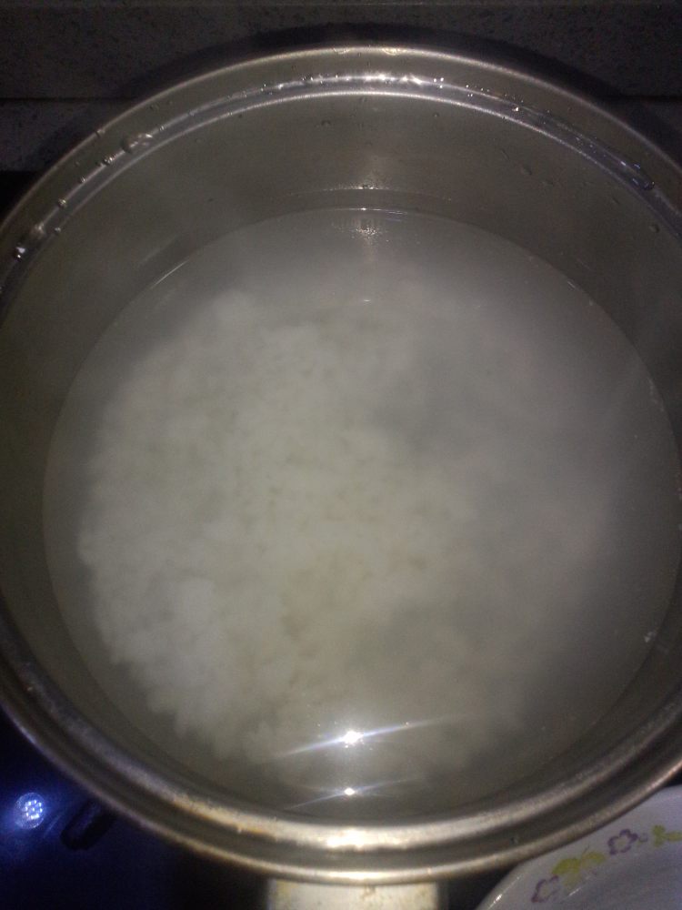 姜丝皮蛋粥步骤9