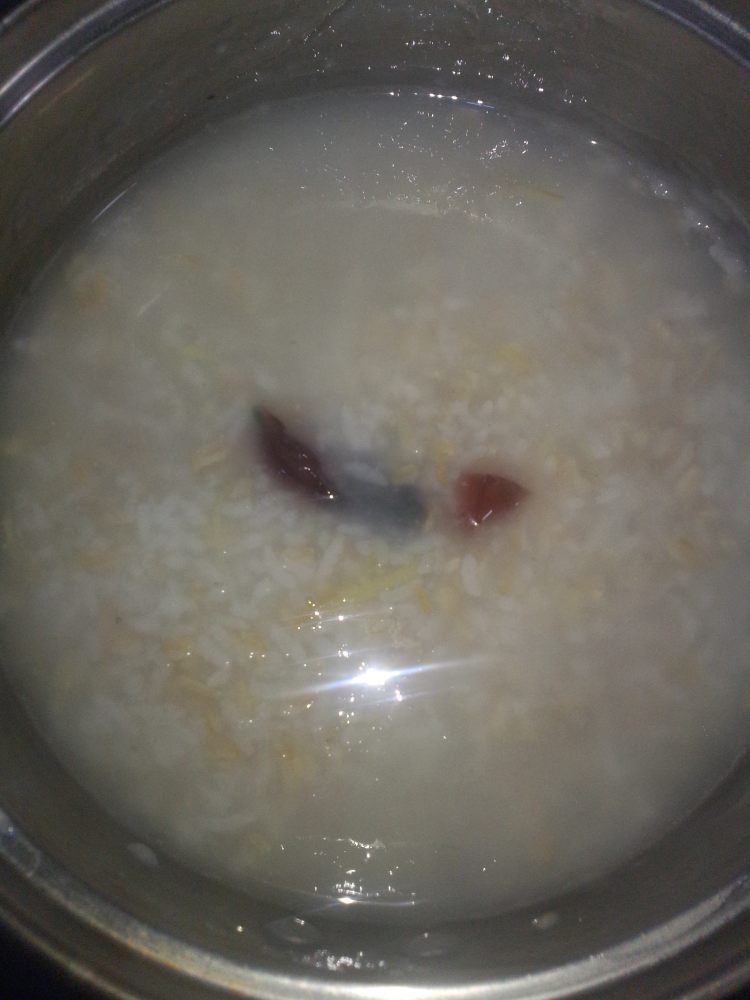 姜丝皮蛋粥步骤13