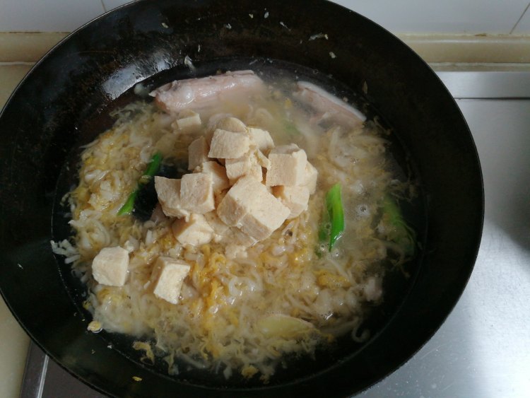 酸菜鱼腩冻豆腐步骤9
