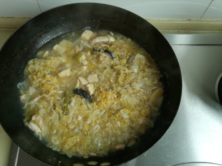 酸菜鱼腩冻豆腐步骤12