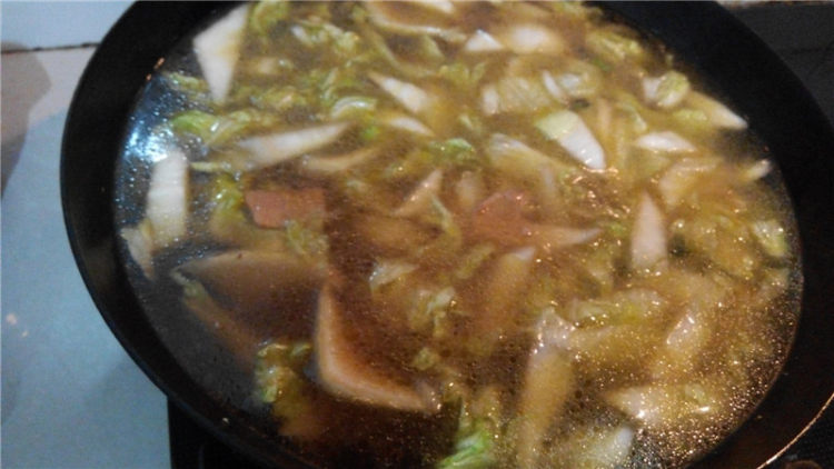 白菜土豆煮面片步骤14