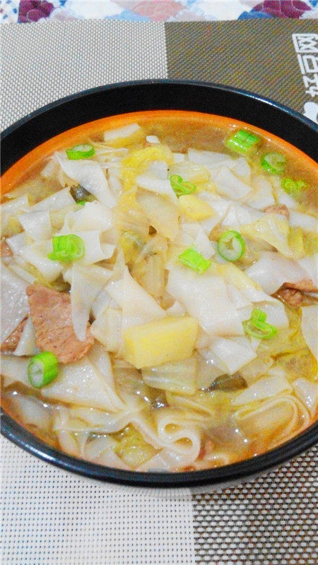 白菜土豆煮面片步骤18