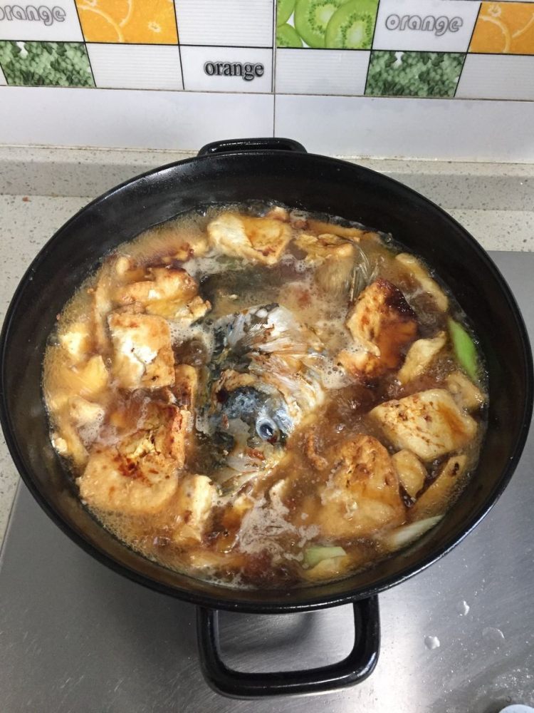 鱼头炖豆腐步骤6